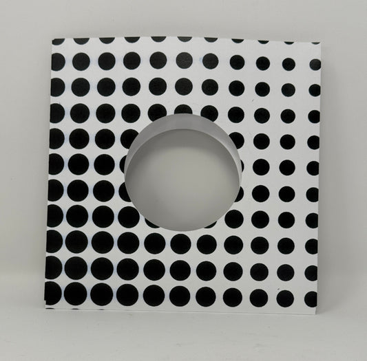 7" record sleeve in card stock with graduating polka dots in an op art pattern