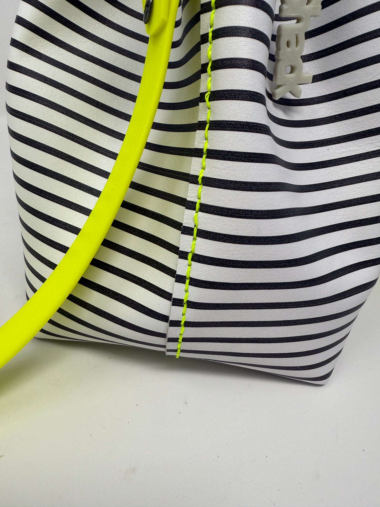 Black and White Striped Leather Drawstring Bucket Crossbody Bag